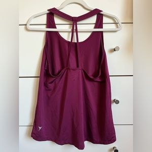 Open razor back tank top. Deep magenta
